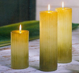 Reminiscent of their namesakes  growing wild in the Rain forest of Thailand  these banana leaf candles are actually created from rolled wax. First a candle is poured and then  when it has cooled sufficiently  it is rolled in layers of additional wax  thus creating a unique look. They are further sculpted and textured by hand  to achieve the final effect of a Banana Leaf. Comes unscented with a coordinating hang tag.