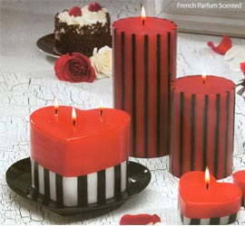 An American In Paris. Well  even if you can't get to Paris this week  you can experience a little Paris with you at home with these Paris Nights Striped Candles. Choose from our scented striped pillar candles or our 3 wick heart on a tray candle. All candles are French Parfum scented.