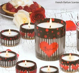 An American In Paris. Well  even if you can't get to Paris this week  you can experience a little Paris with you at home with this Paris Nights Amour 6-Pc Tea light Set. Instantly transforms any room  into your own soothing parisian oasis. French Parfum Scented and beautifully packaged with a black satin ribbon  perfect for gift giving. Includes 6 amour red heart tealights. Amour Glass Candle not included.
