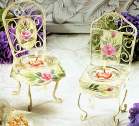 What time is it  it's tea time. If you love to have the girls over for tea  you'll certainly  want to add this adorable Tea Time Hand Painted Chair to your candle collection. Each chair is hand painted and comes with the cutest rose tealight and holder set right in the middle. These chairs look so real  you'll want to sit on them. Please don't though  especially when lit  otherwise you'll burn your bum. Tealight is included and they come unscented.