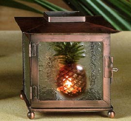 Want to create instant ambience? This rustic metal Palm Trees & Pineapple Glass Tealight Lantern will create a great effect in the any room. This is a very relaxing piece by itself and even more beautiful when it is illuminated with a tealight in the dark. Tealight NOT included.